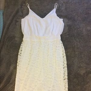 Knee length white lace dress